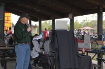 MINOT AIR FORCE BASE, N.D. — Colonel Joel Westa, 5 Bomb Wing commander, thanks everyone for coming and for all of the help that was provided during the base picnic here May 29. Warbirds and Rough Riders alike came together to celebrate the beginning of summer with the base-wide picnic that included a dunk tank, door prizes, a barbecue, a disc jockey and a bounce house for the kids. (U.S. Air Force photo by Senior Airman Cassandra Jones)