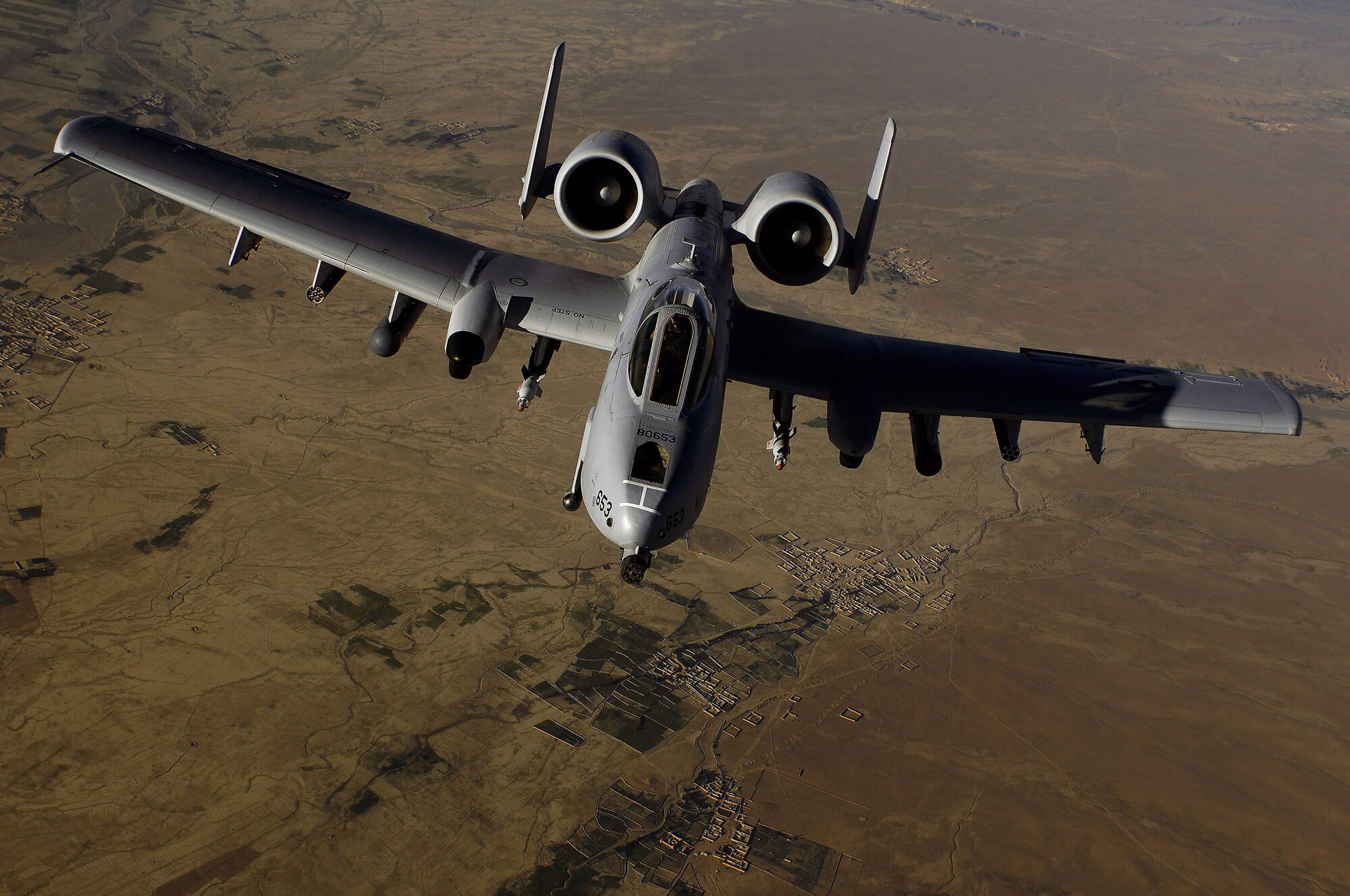 An Air Force A-10 Thunderbolt II flown by a pilot from the 303rd Fighter Squadron moves into position to receive fuel May 29, 2008, from a KC-135 Stratotanker during a mission over Afghanistan. The aircraft belongs to the Idaho Air National Guard, but is being flown by an Air Force Reserve pilot during a "split" deployment between the Reserve and two Air National Guard units.  The 303rd is part of the 442nd Fighter Wing, based at Whiteman Air Force Base, Mo.  (U.S. Air Force photo/Master Sgt. Andy Dunaway) 