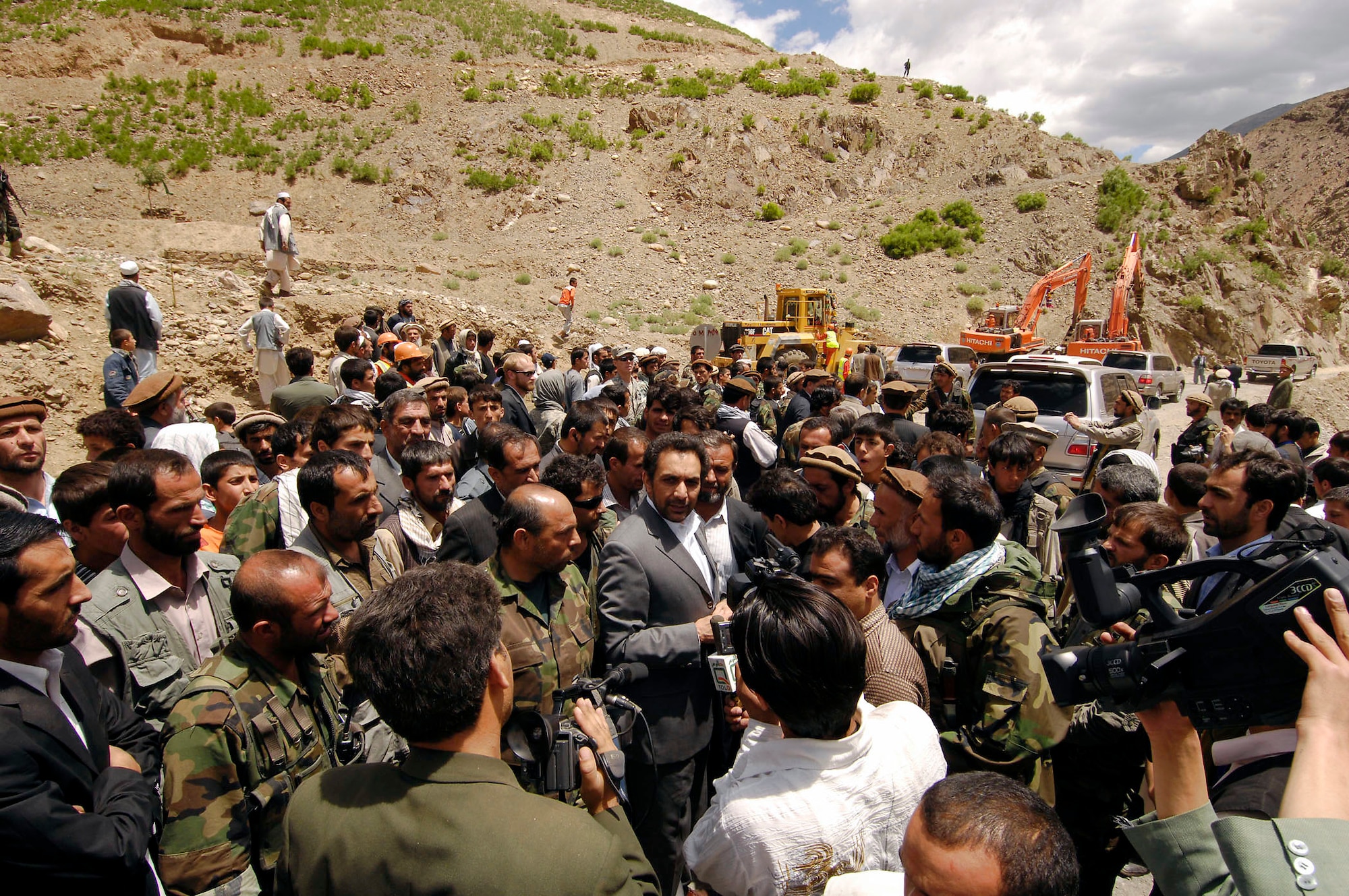 Afghan Vice President Ahmad Zia Massoud speaks to a crowd of more than 1,000 at a groundbreaking ceremony for the Barak to Khenj road May 28 in Barak of the Bazarak District of the Panjshir province in Afghanistan. Vice President Massoud, members of parliament, local government and the Panjshir Provincial Reconstruction Team spoke of the logistical and economic freedom the road will bring to the central reaches of the province. The 18-kilometer, two-lane road is scheduled to be completed in March 2009. (U.S. Air Force photo/Master Sgt. Demetrius Lester) 

