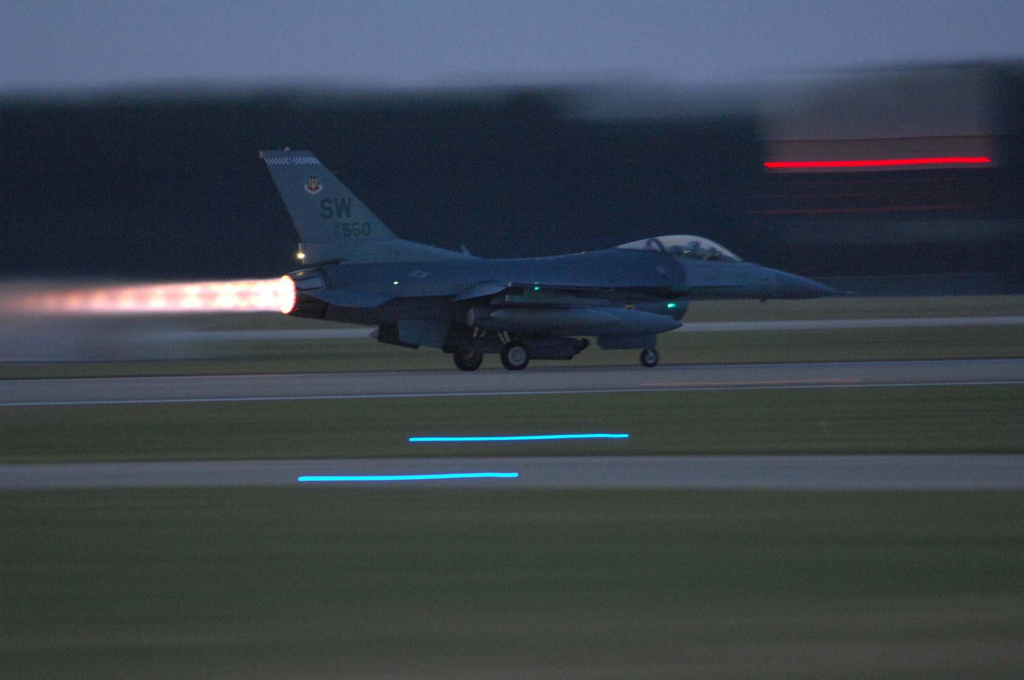SHAW AIR FORCE BASE, S.C. -- An F-16 Fighting Falcon takes off early morning to support the 77th Fighter Squadron in a deployment for Balad Air Base Iraq. More than 200 Airmen and a dozen F-16s from the 20th Fighter Wing deployed to Iraq to support the Global War on Terrorism. (U.S. Air Force photo/Senior Airman William Coleman)