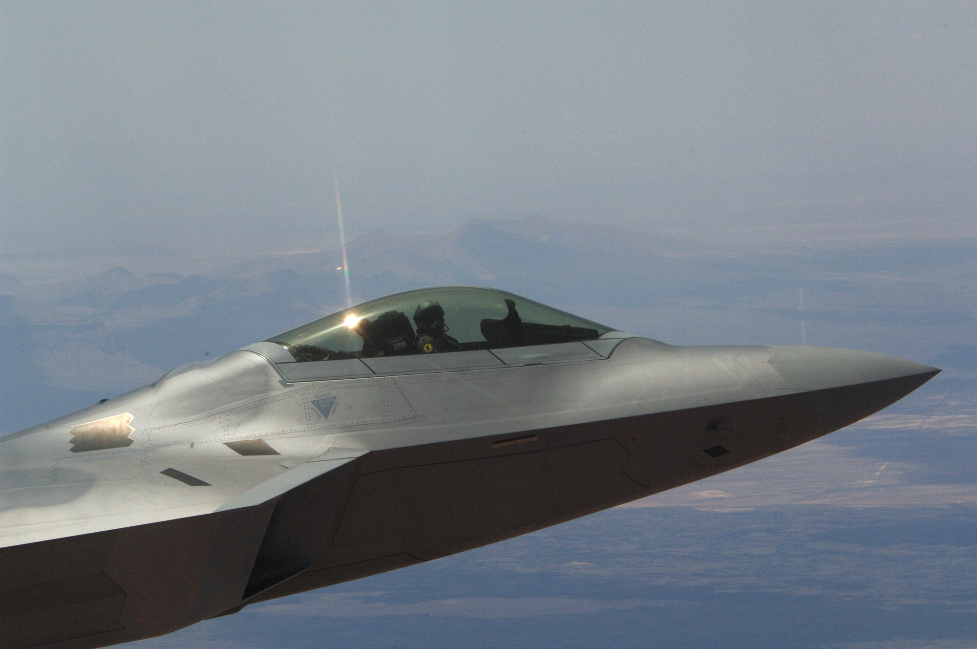 An F-22A Raptor flies near Holloman Air Force Base, N.M., in route to the F-22 arrival ceremony June 2. The jet is one of the first two Holloman-tailed F-22's to arrive on base. (U.S. Air Force Photo/Senior Airman Russell Scalf)
