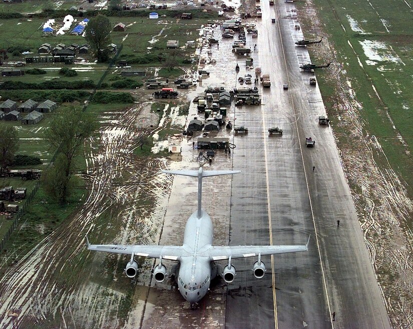 Relief supplies are offloaded from a Charleston C-17 at Tirana airfield, Albania, during Operation Sustain Hope April 14, 1999. Sustain Hope, a combined NATO and joint U.S. military humanitarian relief effort in the former nation of Yugoslavia, was one of many relief efforts the C-17 has been involved in during the past 15 years. (U.S. Air Force photo/Staff Sgt. Chris Steffen)