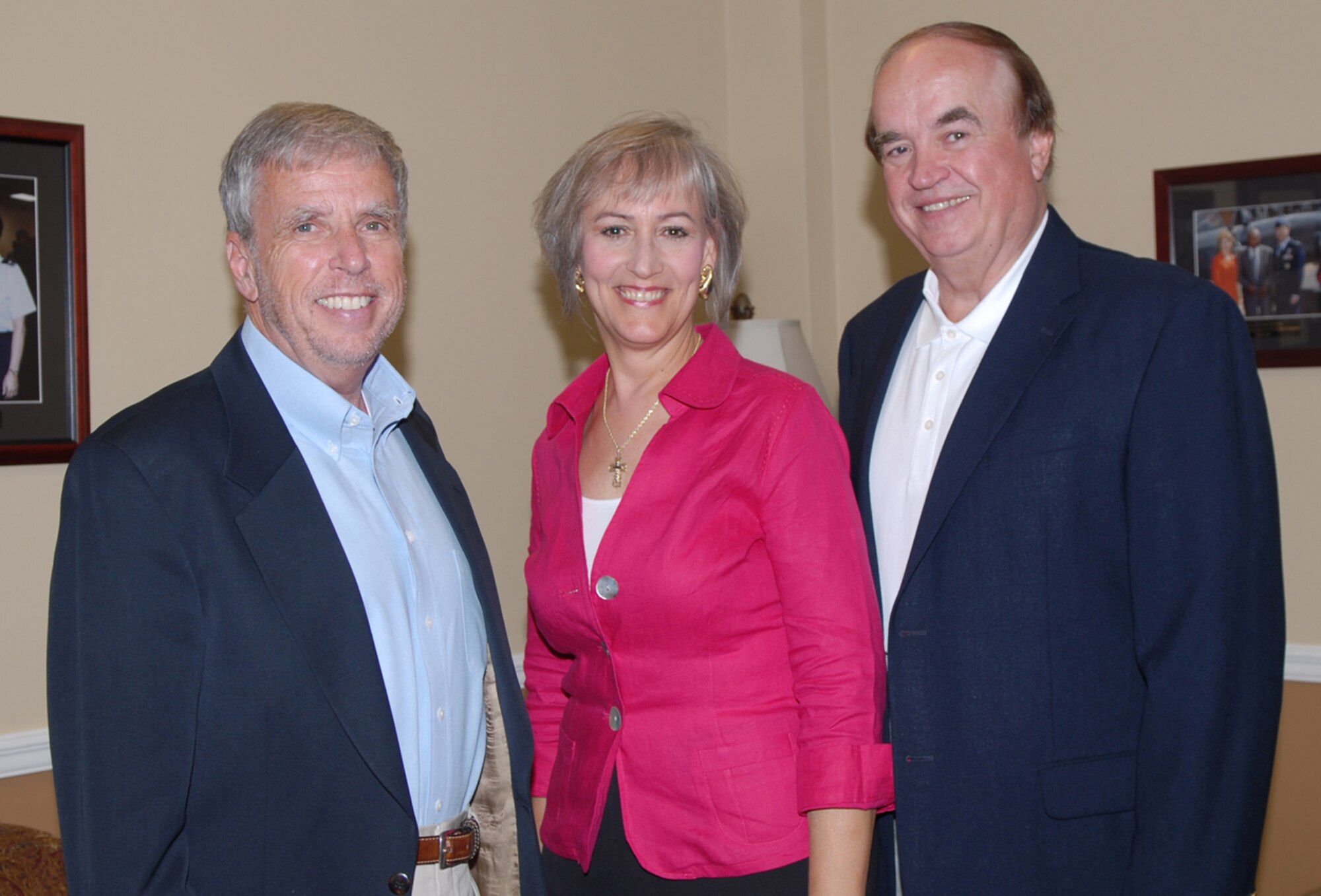Retired General Robert Foglesong, former 14th Flying Training Wing commander, stands with Burnette Avakian and Dick Leike, the newest Columbus Wingmen. General Foglesong was the founder of the Wingman program, which was started in 1993. With the departure of each successive wing commander, another member of the community is recognized. (U.S. Air Force photo by Melissa Duncan)