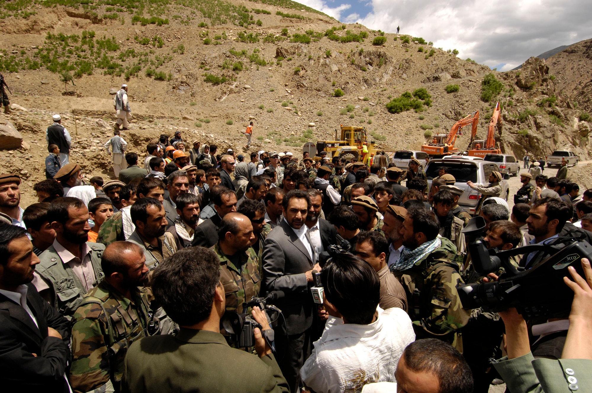 PANJSHIR PROVINCE, Afghanistan -- Ahmad Zia Massoud, Afghanistan's First Vice President and brother of famed Panjshir Martyr and Afghan national hero Ahmad Shah Massoud speaks to a crowd of more than 1,000 at a groundbreaking ceremony for the Barak to Khenj road in Barak, Bazarak District, Panjshir May 28. Massoud, as well as members of Parliament, local government, and the Panjshir Provincial Reconstruction Team spoke of the logistical and economic freedom the road will bring to the central reaches of the province.  The 18 kilometer two-lane road is scheduled to be complete in March 2009. (U.S. Air Force photo by Master Sgt. Demetrius Lester)