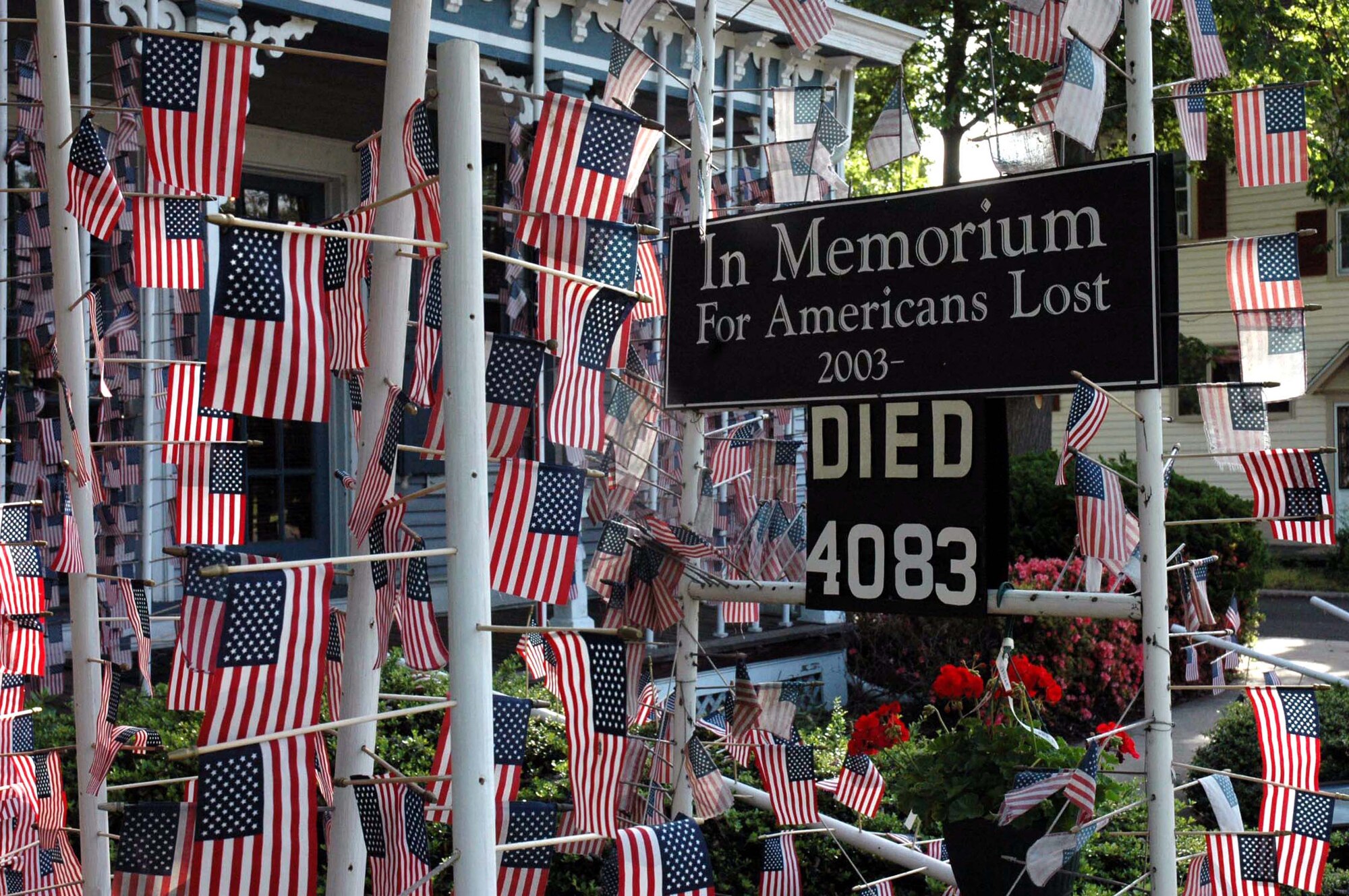 A flag is posted for each fallen U.S. servicemember from Operation Iraqi Freedom at a flag memorial in Cherry Hill, N.J., built by resident Michael Bloom.  The memorial, vandalized in April 2008, was repaired by Airmen volunteers from the U.S. Air Force Expeditionary Center at Fort Dix, N.J., May 28, 2008.  The memorial has more than 4,000 American flags and is again a landmark in this New Jersey city. (U.S. Air Force Photo/Staff Sgt. Paul R. Evans)