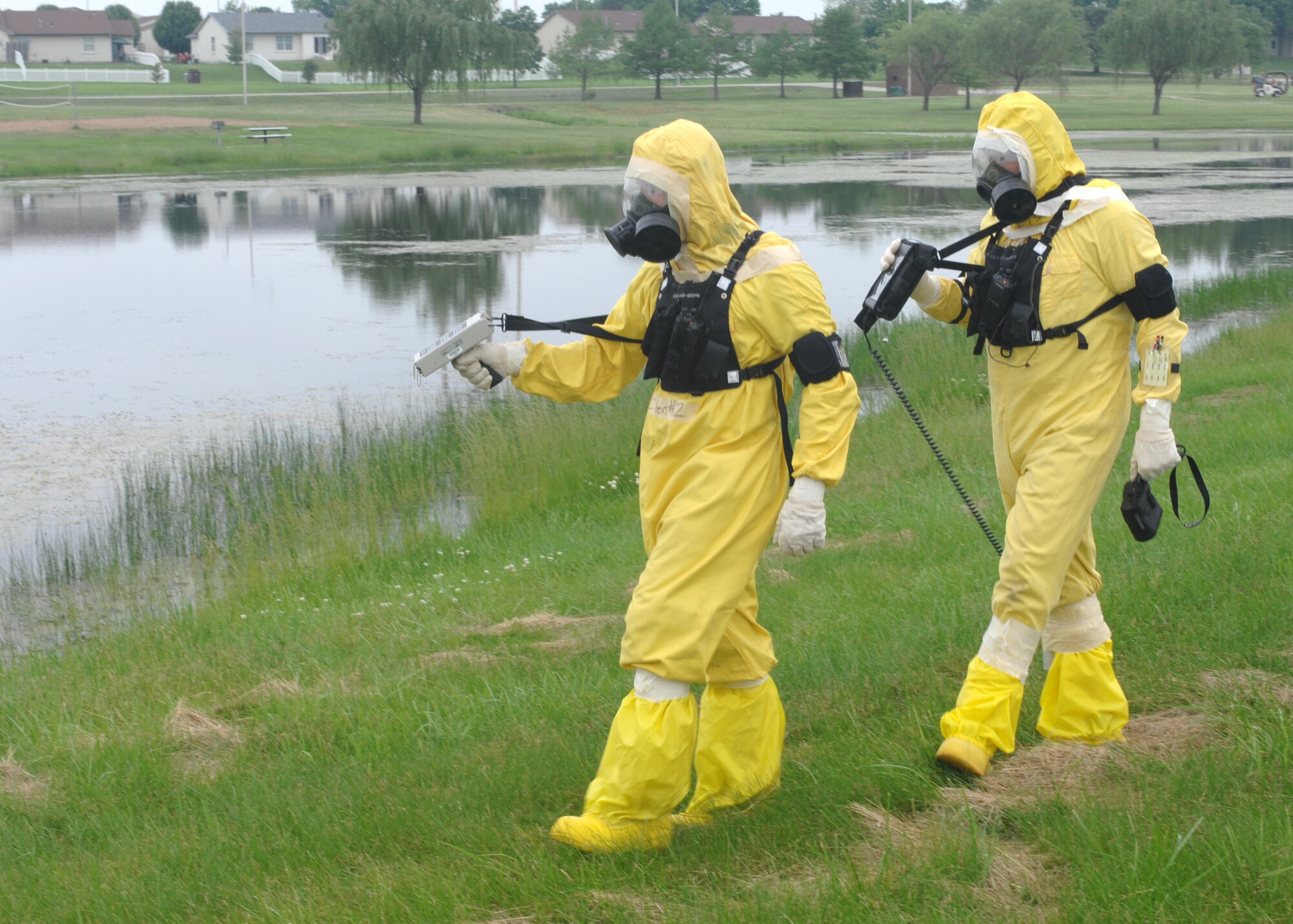 WHITEMAN AIR FORCE BASE, Mo. – Staff Sgt. Thomas Breckel and Airman 1st Class Isaac Stein,509 Civil Engineer Squadron, perform an 8 leg radial survey during a training session May 28 to determine how far from the "accident" site contamination had traveled. The training is part of the preparation for the Nuclear Surety Inspection June 3-11. (U.S. Air Force photo/Tech. Sgt. Samuel A. Park) 