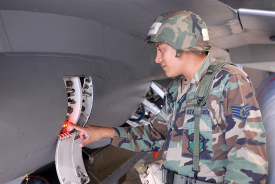 Staff Sergeant Juan Rangel, an Electrician from the 140th Wing, Colorado Air National Guard, is checking for electrical malfunctions on a Maintenance Annunciation Panel on an F-16 during an Operational Readiness Exercise.  

Members from the Montana, New Mexico and Colorado Air National Guard units, know as the "Rocky Mountain Coalition", are currently deployed to Kunsan Air Base as part of an out of cycle Air Expeditionary Support mission as contingency base support as well as performing many training missions while here.

Photo by Senior Master Sergeant John Rohrer, 140th Wing, Colorado Air National Guard