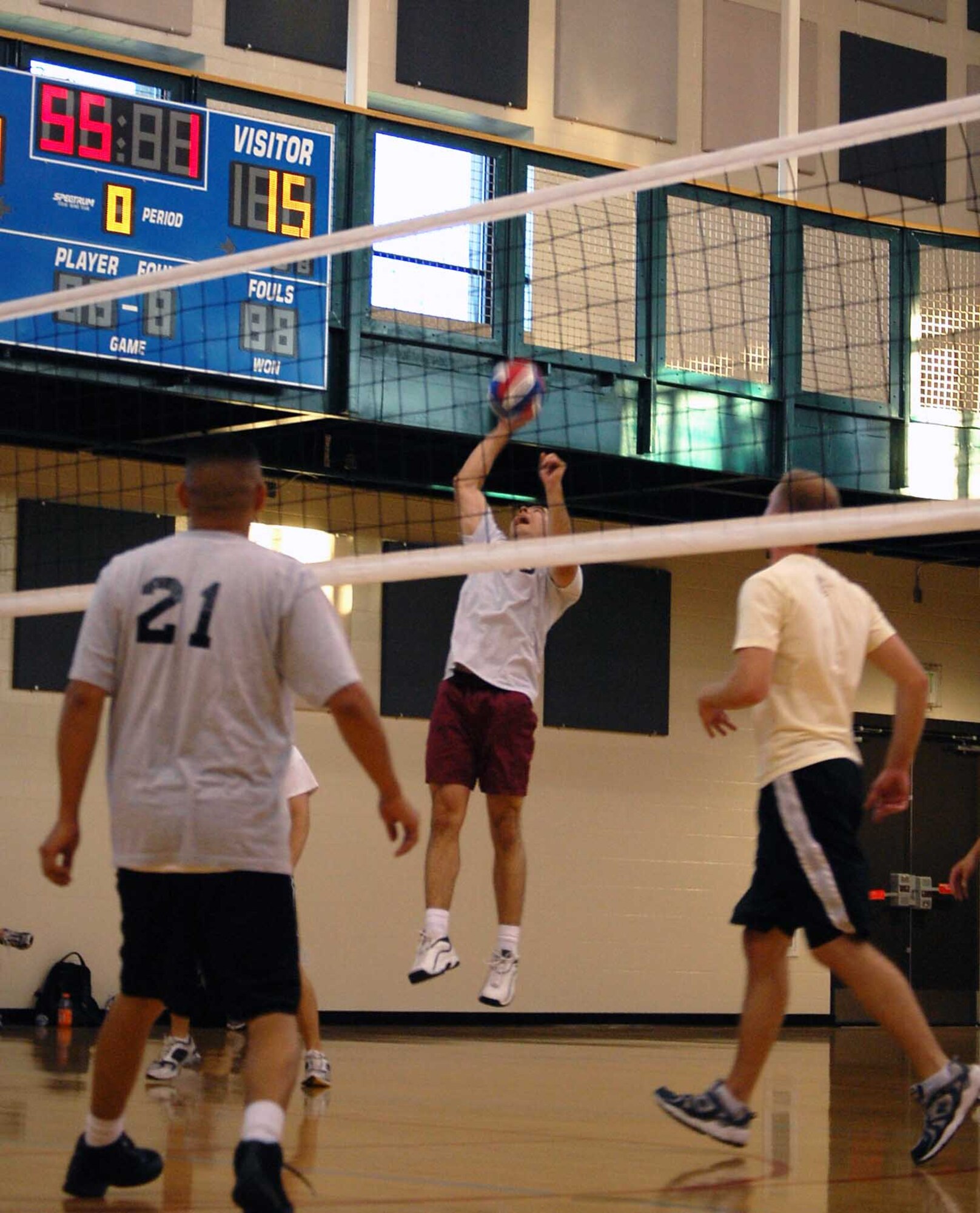 LAUGHLIN AIR FORCE BASE, Texas – Members from the 84th and 85th Flying Training Squadron try their hardest to score a point against the Team DEL JEN during the Intramural Volleyball Championship here June 2. The 84th and 85th FTS team took home the Championship trophy and a trophy for second best regular season record after beating nine teams throughout the season. (U.S. Air Force photo by Airman 1st Class Sara Csurilla) 