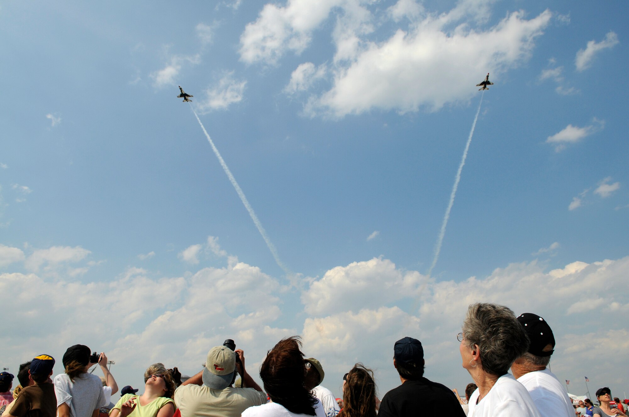 The U.S. Air Force Thunderbirds perform aerial maneuvers above the crowd at the 2008 McGuire Air Expo held May 31 and June 1. The air expo culminated the events of Air Force Week in Philadelphia, May 26-June 2. (U.S. Air Force photo/Kenn Mann)