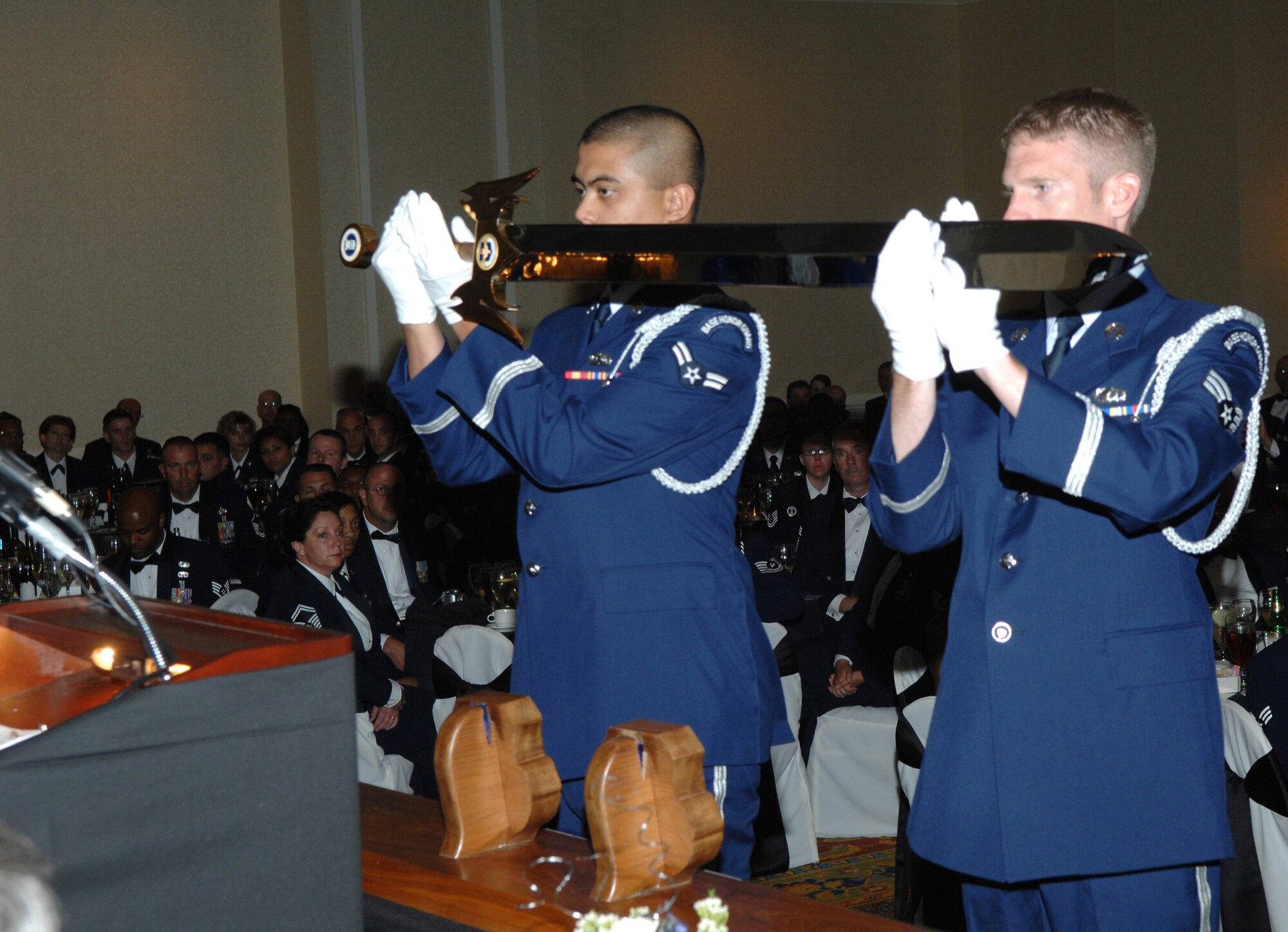 Honor guard members present the Air Education and Training Command sword during the Order of the Sword ceremony for Gen. William R. Looney III May 30 in San Antonio. General Looney is the AETC commander. (U.S. Air Force photo/Joel Martinez)