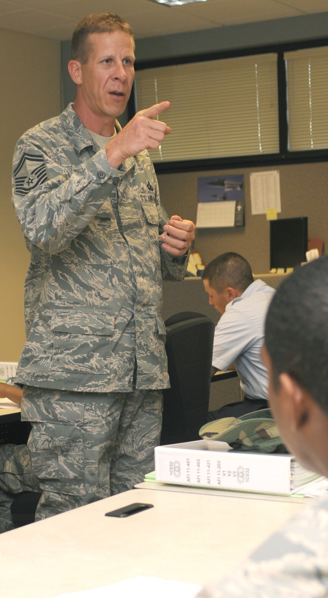 Sergeant Kreiser gives an orientation briefing for new students.  (U.S. Air Force photo by Kemberly Groue)