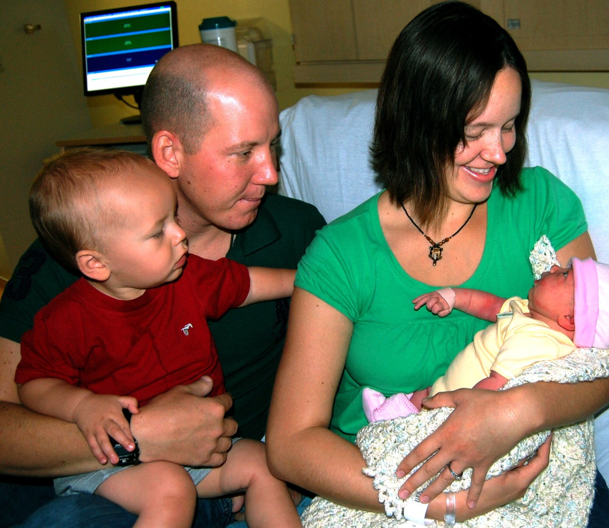 The Glanz family at Keesler Medical Center’s family birthing center.  (U.S. Air Force photo by Steve Pivnick)