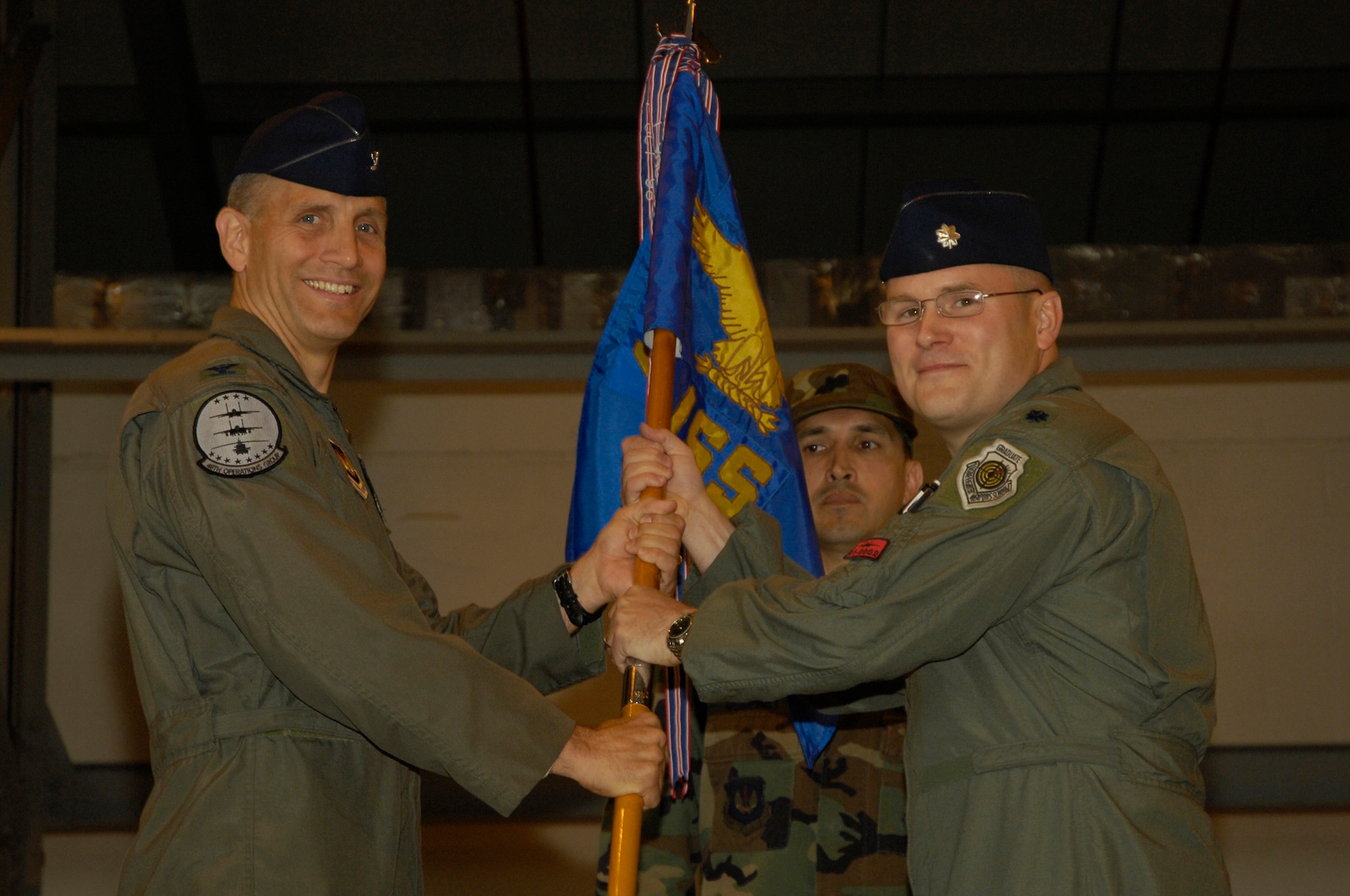 Lt. Col. Mark Ciero assumes command of the 48th Operations Support Squadron from Col. Joe Beissner, 48th Operations Group commander May 29 at RAF Lakenheath, England. (U.S. Air Force photo by Airman Perry Aston)