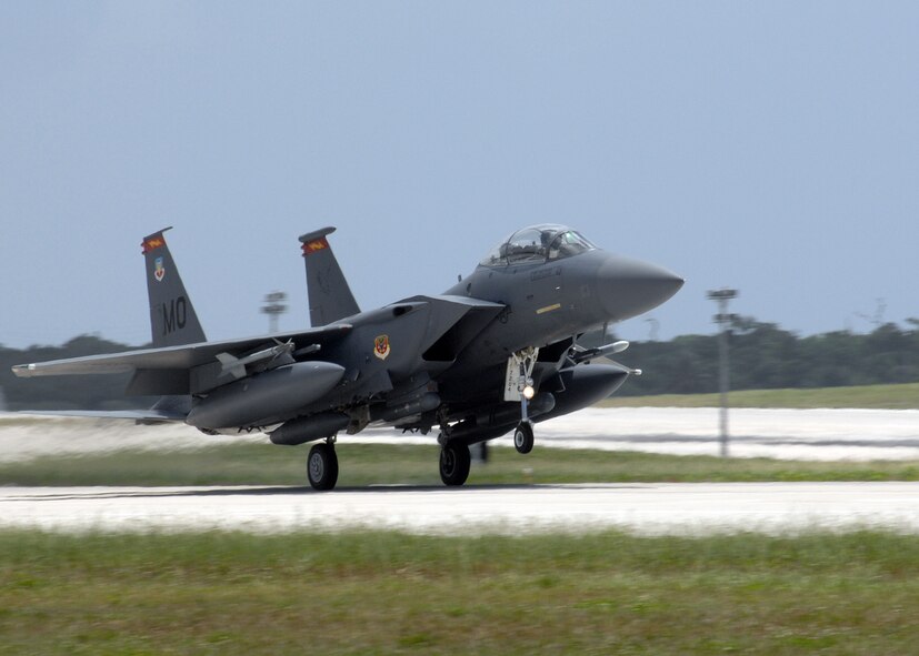 A U.S. Air Force F-15E Strike Eagle touches ground Andersen Air Force Base, Guam, on June 4 from the 389th Fighter Squadron, Mountain Home Air Force Base, Idaho. A total of twelve F-15's are deployed to Andersen for a four month long tour. (U.S. Air Force by Airman 1st Class Nichelle Griffiths) 
