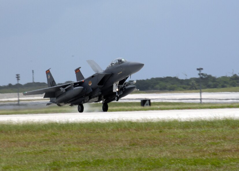A U.S. Air Force F-15E Strike Eagle touches ground Andersen Air Force Base, Guam, on June 4 from the 389th Fighter Squadron, Mountain Home Air Force Base, Idaho. A total of twelve F-15's are deployed to Andersen for a four month long tour. (U.S. Air Force by Airman 1st Class Nichelle Griffiths) 
