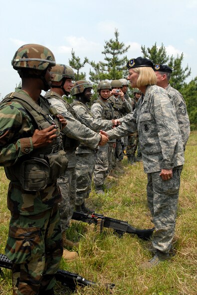 KUNSAN AIR BASE, Republic of Korea -- Brigadier General Mary Kay Hertog, Director of Security Forces, greets security forces Airmen during her visit here June 4.  General Hertog visited the Wolf Pack to discuss upcoming changes that directly affect security forces Airmen. (U.S. Air Force photo/Senior Airman Giang Nguyen)