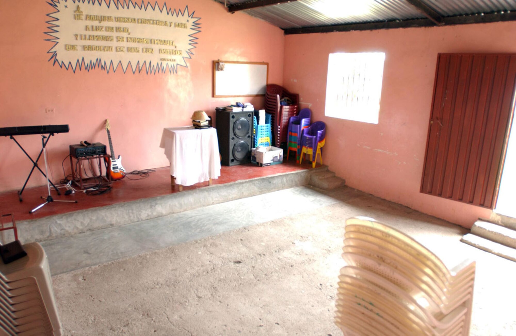 LA PAZ, Honduras -- Soldiers from the 478th Civil Affairs Battalion based in Miami donated money from their own pockets to this one-room church in La Granja's La Paz Barrio. With the funds, the pastor bought new tambourines, books, speakers and chairs for its roughly 50 members. (U.S. Army photo by Sgt. Brandon LeFlore, 363rd Public Affairs Detachment) 