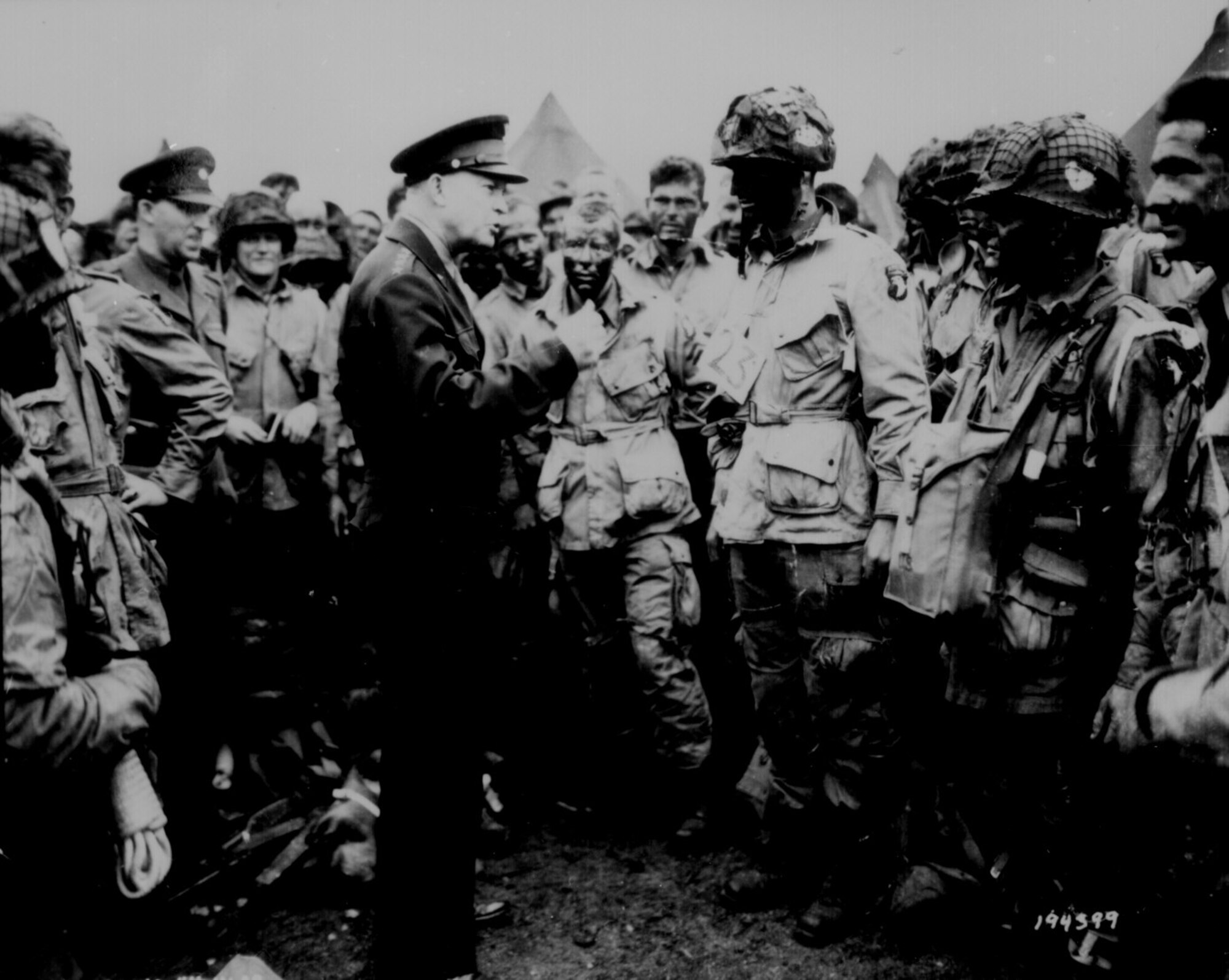 U.S. NATIONAL ARCHIVES -- General Eisenhower gives the order of the day "Full victory - Nothing else" to paratroopers in England just before they board airplanes in the first D-Day assault. More than 1,000 transport aircraft dropped paratroopers to secure the flanks and beach exits. (courtesy photo)