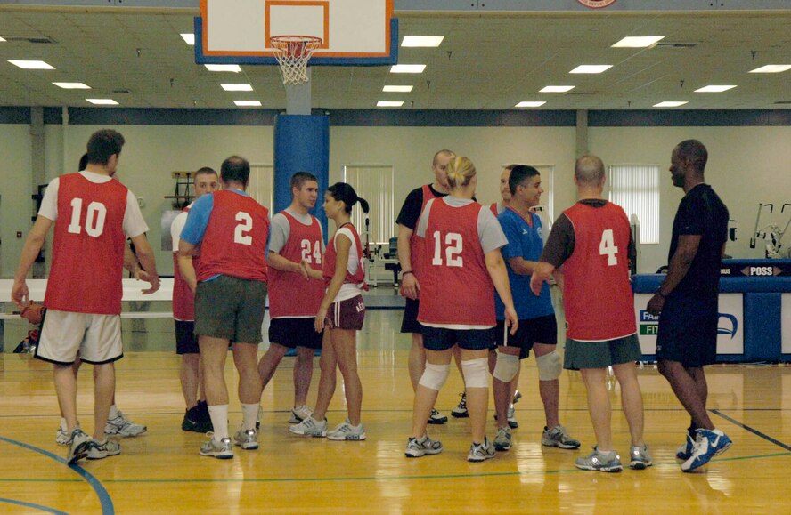 FAIRCHILD AIR FORCE BASE, Wash. – Volleyball team members from the 336th Training Group congratulate each other after their victory against the 92nd Operations Group at the Fitness Center here June 3. The 336th Training Group successfully defended their championship title from last year by finishing the season in first place. (U.S. Air Force photo / Airman 1st Class Darlene West)