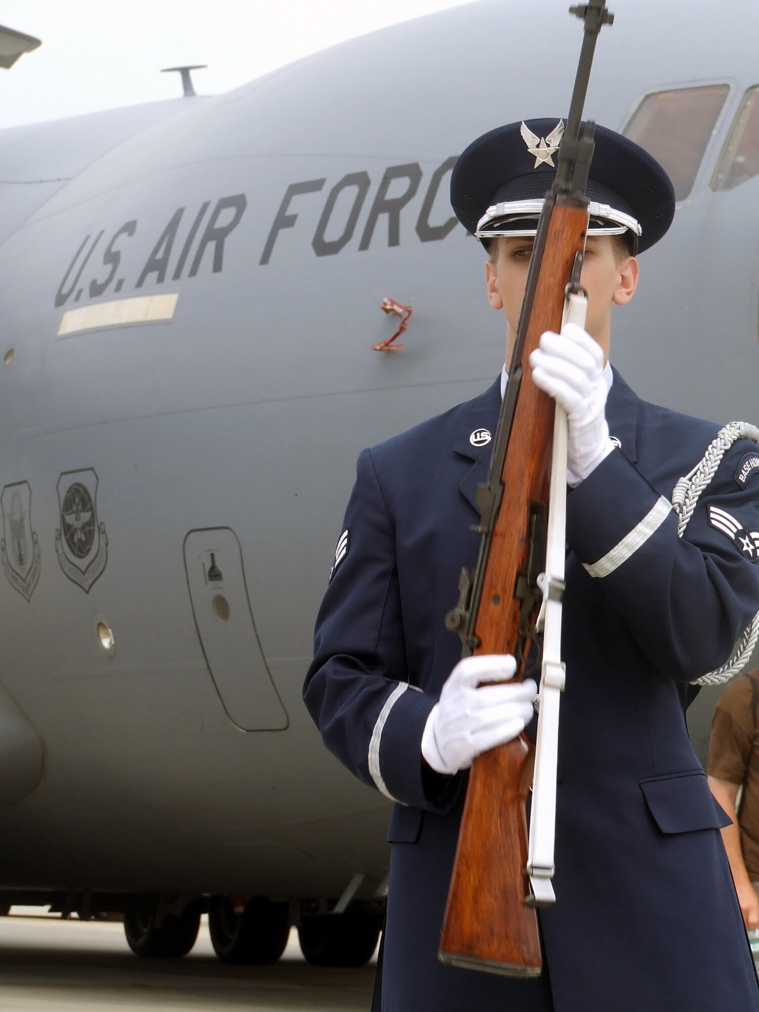 An Airman from the McGuire Air Force Base Honor Guard participates in a wreath-laying ceremony during McGuire's Air Expo May 31, 2008.  Air Expo 2008 was the culminating event for Air Force Week in Philadelphia and drew more than 170,000 people to the base to see aircraft static and aerial displays and numerous other entertainment options.  (U.S. Air Force Photo/Tech. Sgt. Scott T. Sturkol)