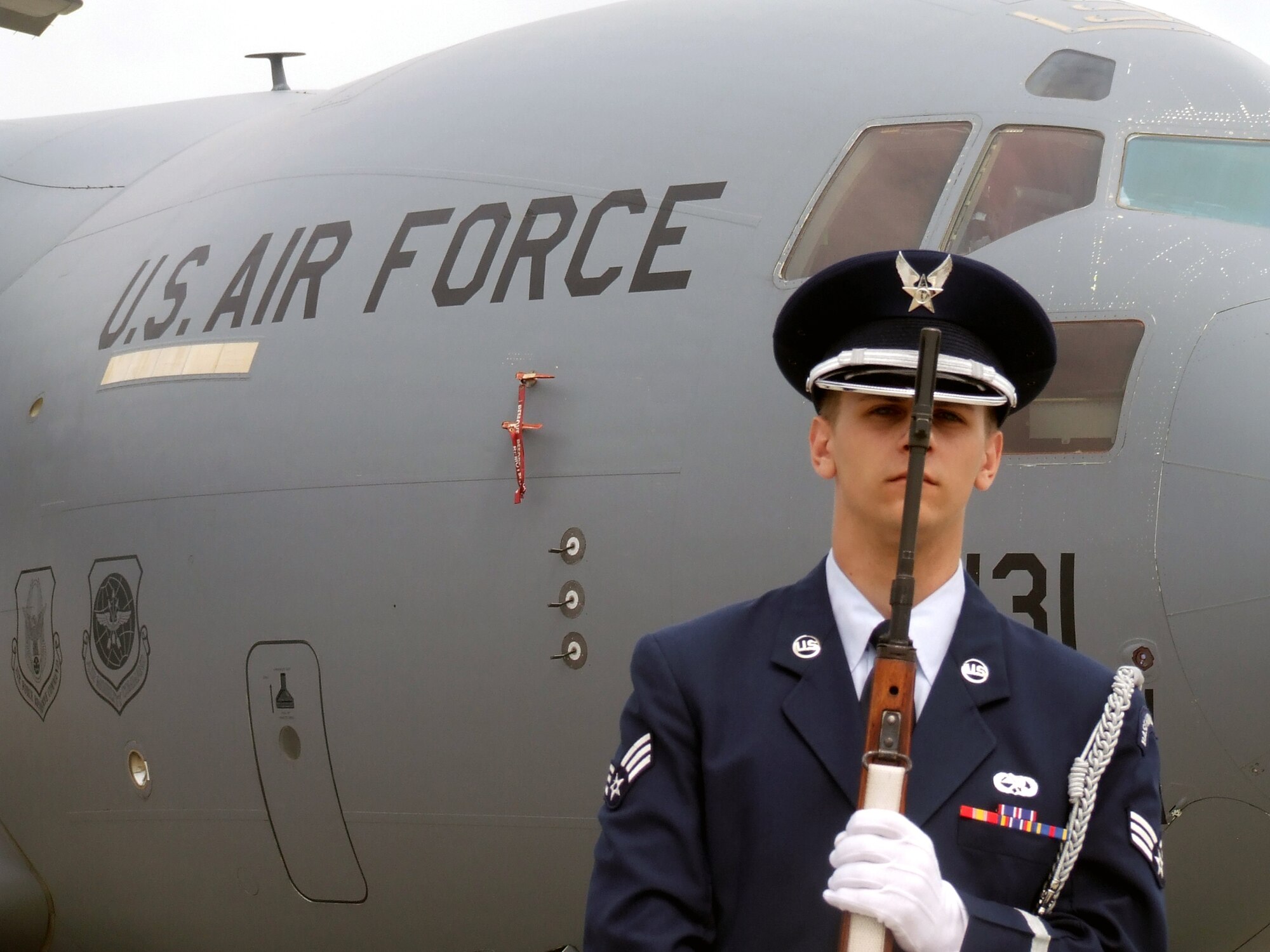 An Airman from the McGuire Air Force Base Honor Guard participates in a wreath-laying ceremony during McGuire's Air Expo May 31, 2008.  Air Expo 2008 was the culminating event for Air Force Week in Philadelphia and drew more than 170,000 people to the base to see aircraft static and aerial displays and numerous other entertainment options.  (U.S. Air Force Photo/Tech. Sgt. Scott T. Sturkol)
