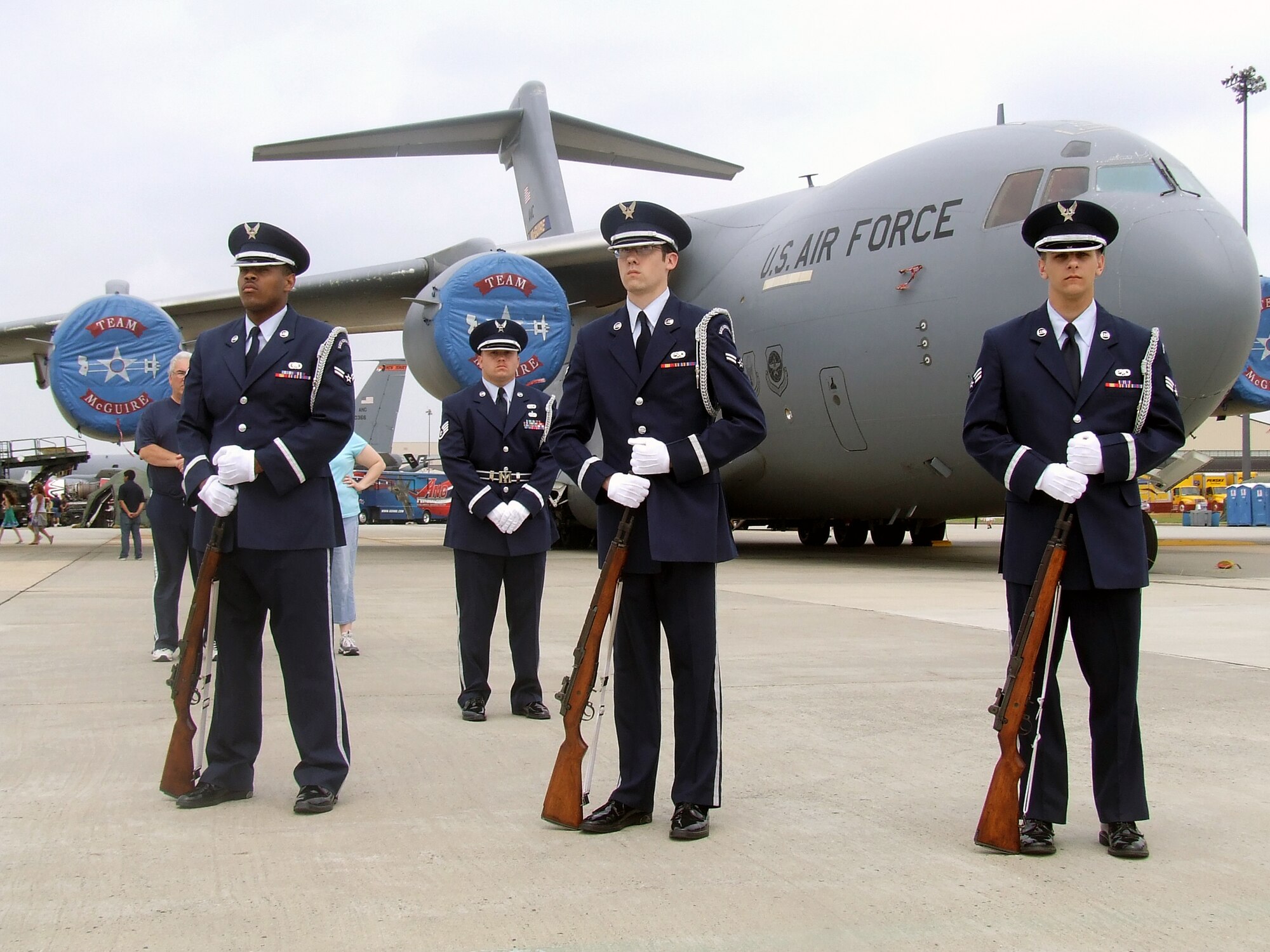Airmen from the McGuire Air Force Base Honor Guard participate in a wreath-laying ceremony during McGuire's Air Expo May 31, 2008.  Air Expo 2008 was the culminating event for Air Force Week in Philadelphia and drew more than 170,000 people to the base to see aircraft static and aerial displays and numerous other entertainment options.  (U.S. Air Force Photo/Tech. Sgt. Scott T. Sturkol)