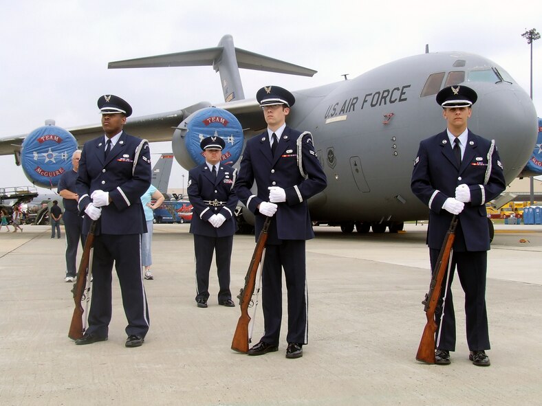Airmen from the McGuire Air Force Base Honor Guard participate in a wreath-laying ceremony during McGuire's Air Expo May 31, 2008.  Air Expo 2008 was the culminating event for Air Force Week in Philadelphia and drew more than 170,000 people to the base to see aircraft static and aerial displays and numerous other entertainment options.  (U.S. Air Force Photo/Tech. Sgt. Scott T. Sturkol)