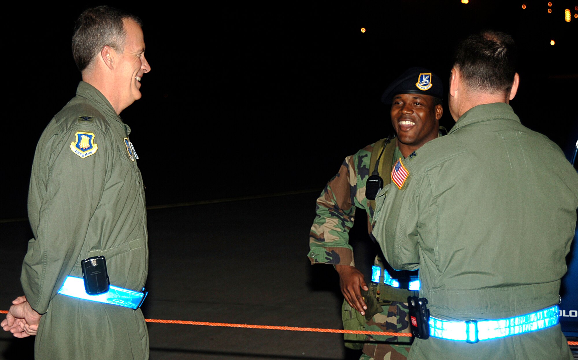 MCCONNELL AIR FORCE BASE, Kan. -- Colonel Michael Krueger, 22nd Air Refueling Wing vice commander, and Col. Stuart Shaw, 22nd Operations Group deputy commander, visit with Staff Sgt. Dearlyn Gary, 22nd Security Forces Squadron, on the flightline, during a Nuclear Operational Readiness Inspection.  Colonels Krueger and Shaw visited with many Airmen out on the line to ensure everyone was staying safe and to increase morale. (Photo by Staff Sgt. Ronald Lafosse)