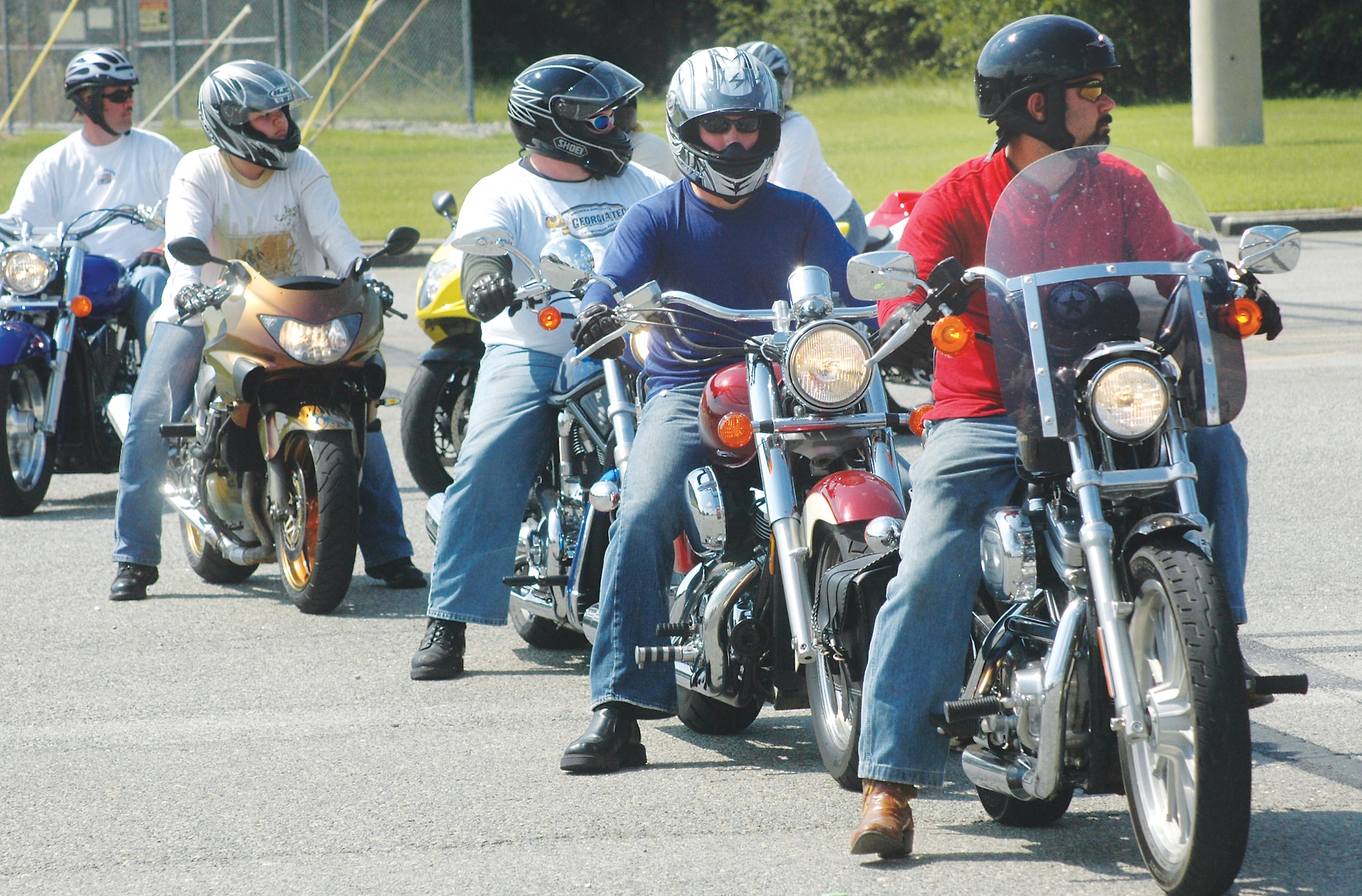 Riders line up for their turn on the motorcycle training course on base. Motorcycle Safety Foundation training is required before riders can operate a motorcycle on Robins. U. S. Air Force photo by Sue Sapp