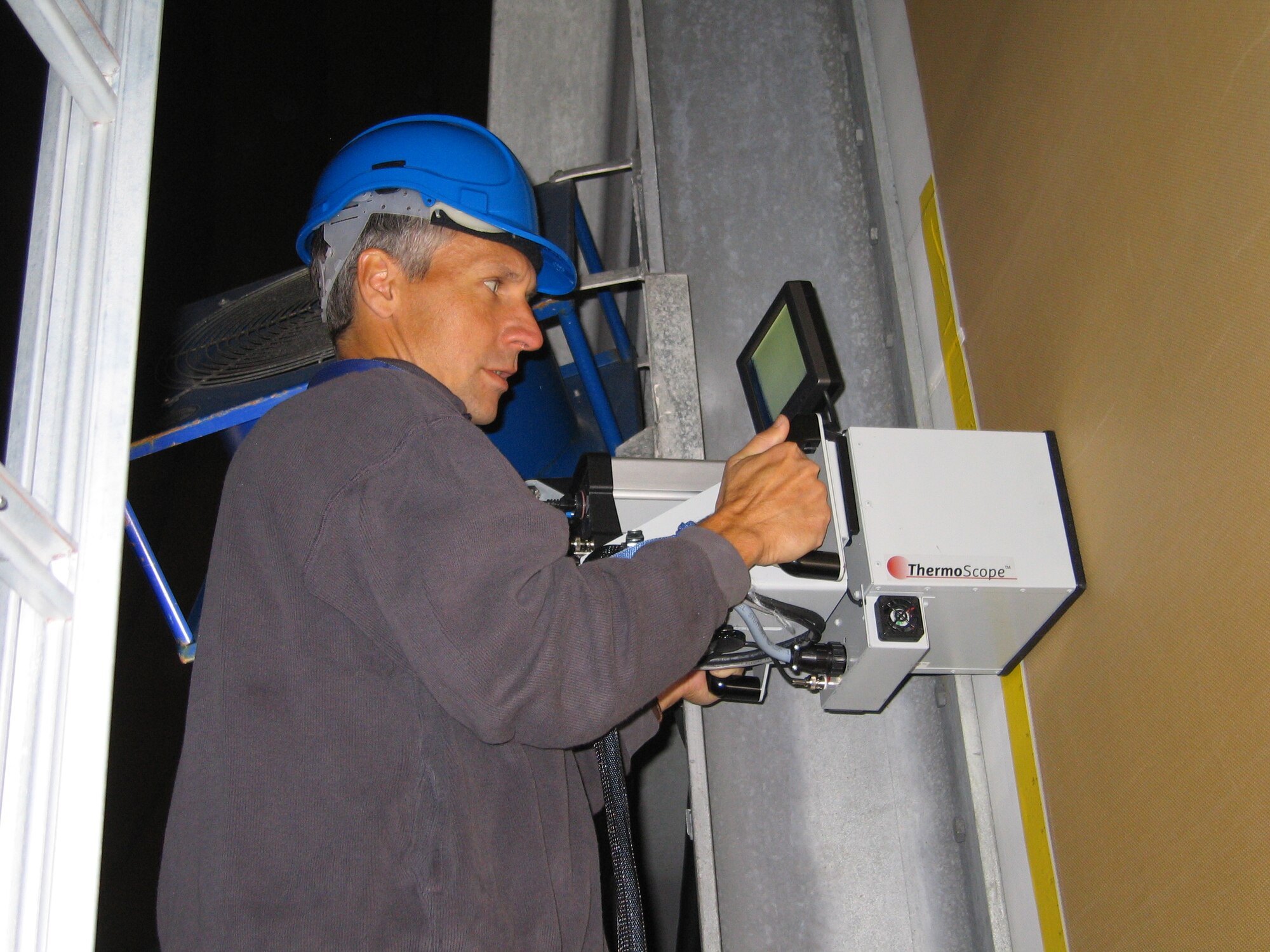 Mr. Kenneth LaCivita, an AFRL/RX engineer performs a thermography inspection in Vardo, Norway.