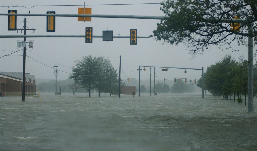 LANGLEY AIR FORCE BASE, Va. -- This photo of Sweeney Boulevard was taken during Hurricane Isabel Sept. 18, 2003. Isabel left 32 fatalities and $1.9 billion in damages throughout Virginia. (U.S. Air Force photo/Tech. Sgt. Ben Bloker)