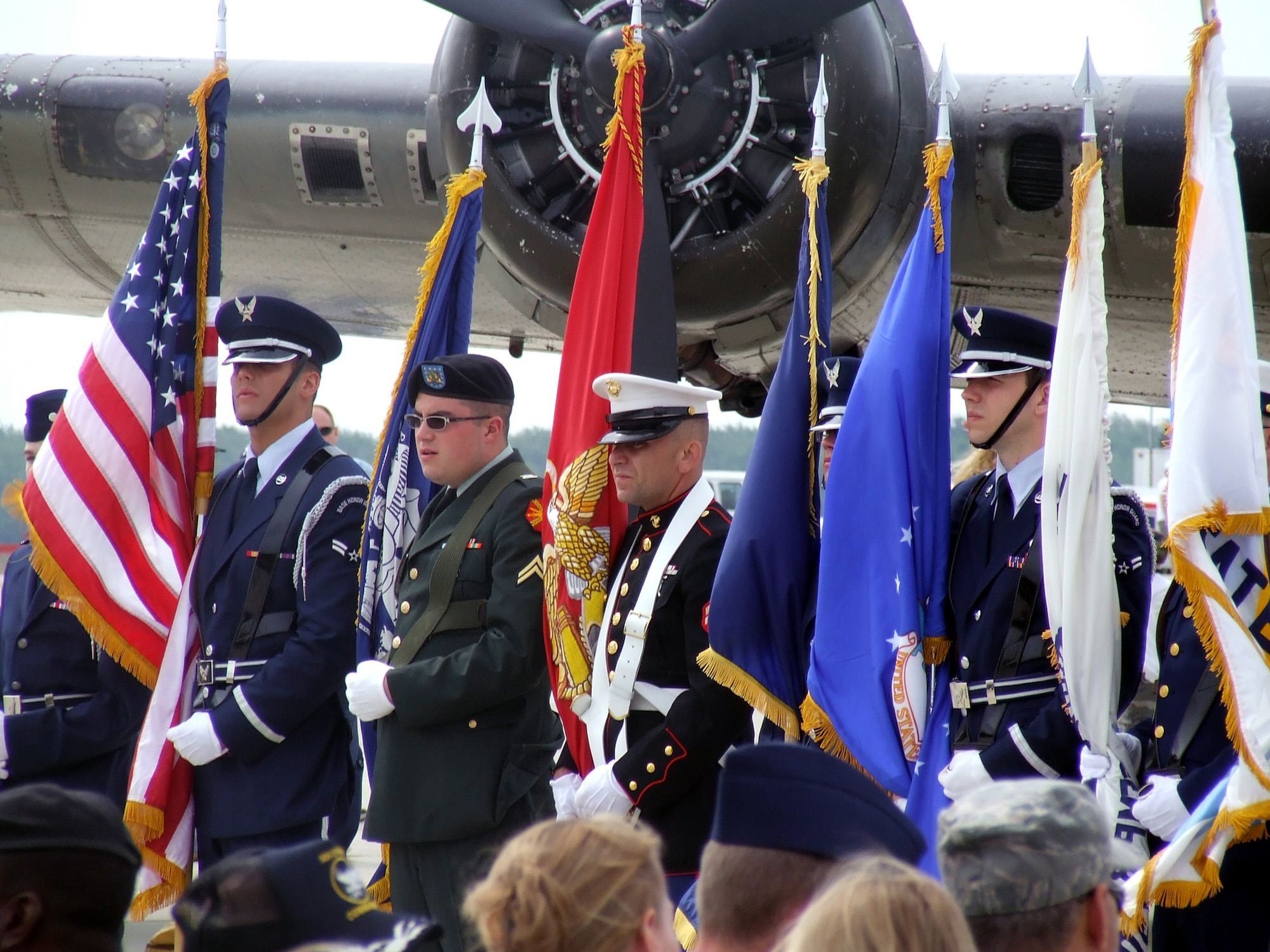 A color guard featuring members of all military services and the New Jersey State Police participate in a special wreath laying ceremony during the McGuire Air Force Base, N.J. Air Expo on McGuire May 31, 2008.  The expo was the culminating event for Air Force Week in Philadelphia.  Overall, through both days of the expo, more than 170,000 people visited.  (U.S. Air Force Photo/Tech. Sgt. Scott T. Sturkol)