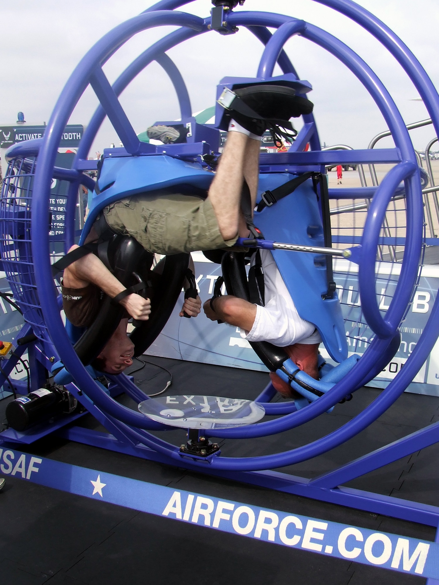 Visitors to the McGuire Air Force Base, N.J., Air Expo 2008 try out the "Extreme Equilibrium" set up by Air Force recruiting May 31, 2008, on McGuire.  The expo was the culminating event for Air Force Week in Philadelphia.  Overall, through both days of the expo, more than 170,000 people visited.  (U.S. Air Force Photo/Tech. Sgt. Scott T. Sturkol)