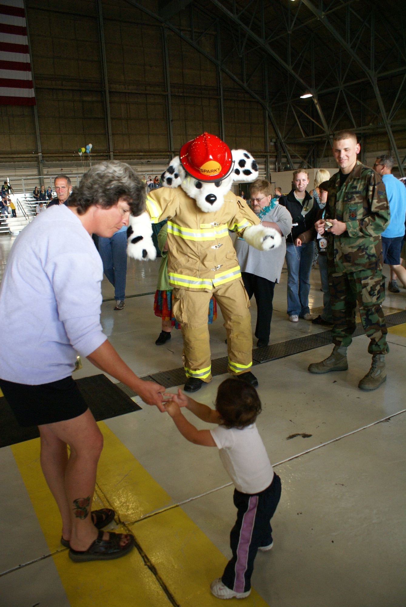 McChord's Fire Dog, Sparky, makes an appearance at Saturday's
victory dance. (U.S. Air Force photo/Staff Sgt. Eric Burks)