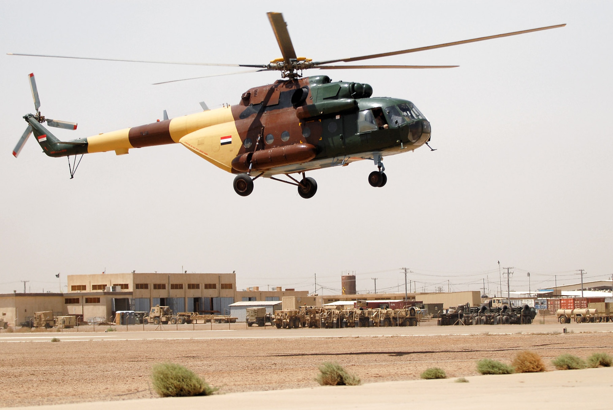 An Mi-17 multi-role helicopter lands May 28 after a training mission over Camp Taji, Iraq. The missions enable the Air Force pilots assigned to the 770th Air Expeditionary Advisory Squadron to train Iraqi air force pilots on the practical applications of lessons learned in a classroom setting. The 770 th AEAS is responsible for training and assisting two Iraqi air force squadrons that are in the process of setting up their own helicopter wing. (U.S. Air Force photo/Senior Airman Julianne Showalter) 