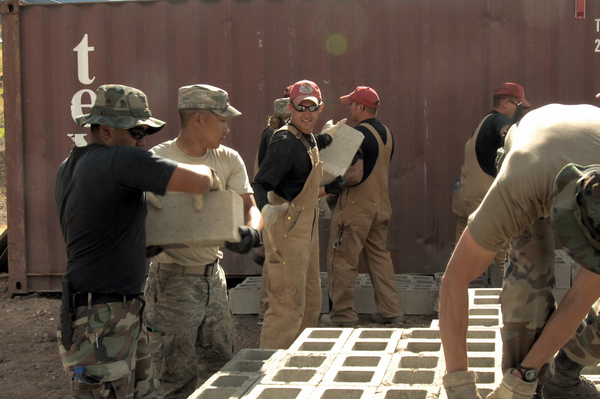 Airmen assigned to Task Force New Horizon-Peru 2008 stack cement blocks June 3 to begin the construction of a clinic in Yanama, Peru, in support of New Horizons Peru 2008, a humanitarian event that benefits thousands of Peruvians. Nearly 300 members from the U.S. military came together to provide Peruvians with new schools, clinics and water wells. (U.S. Air Force photo/Tech. Sgt. Kerry Jackson) 