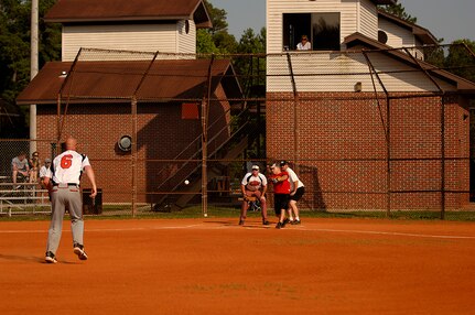 The Communications Squadron "Commies" were defeated 21-1 by the AMXS "Inmates" during an intramural softball game at the softball fields on Charleston AFB June 4.