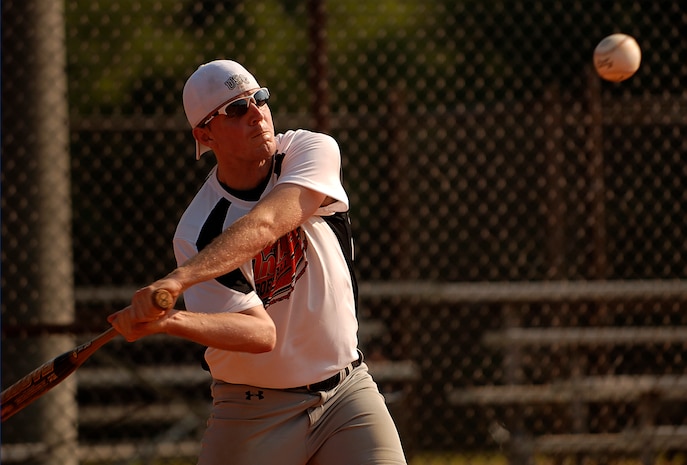 Ken Travis bats during an intramural softball game at the softball fields on Charleston AFB June 4. Travis plays for the 437 AMXS "Inmates." 
