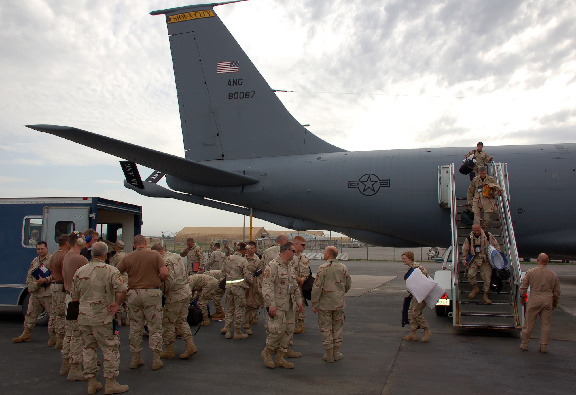 Members of the 185th Air Refueling Wing of the Iowa Air National Guard arrive May 31 to Manas Air Base, Kyrgyzstan. The Air National Guard crews and maintenance teams will work alongside active-duty Airmen as an integrated team. (U.S. Air Force photo/Tech. Sgt. Jerome Baysmore) 