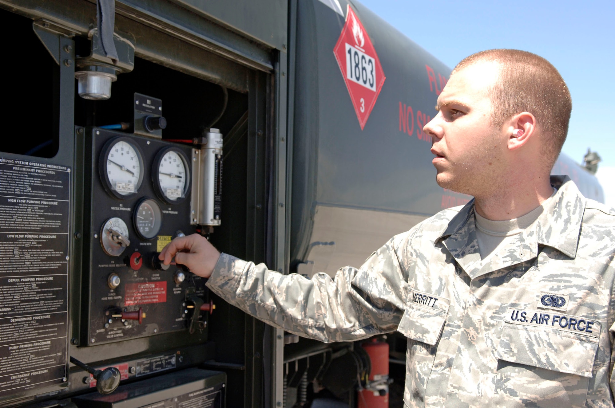 SCOTT AIR FORCE BASE, Ill. -- Airman 1st Class Stephen Merritt, 375th Logistics Readiness Squadron, Fuels Management Flight, distribution operator, monitors the gages and dials on the 6,000 gallon jet fuel truck used to fill aircraft at Scott Air Force Base.
(US Air Force photo/Tech Sgt. Tony Tolley)
