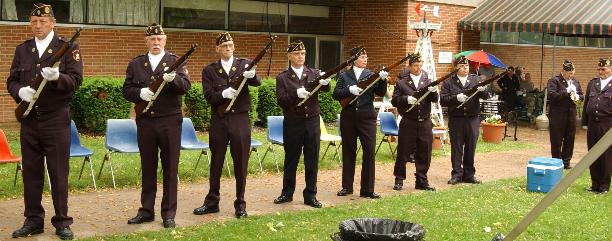 SCOTT AIR FORCE BASE, Ill. -- The Illinois’ American Legion Firing Squad performed a 21-gunshot salute after a roll call was called for residents who died from May 30, 2007 to May 29, 2008. Following the 21-gunshot salute, one member of the Illinois’ American Legion Firing Squad played Taps on a bugle. 
(US Air Force photo/ Airman First Class Amber Kelly-Woodward)
