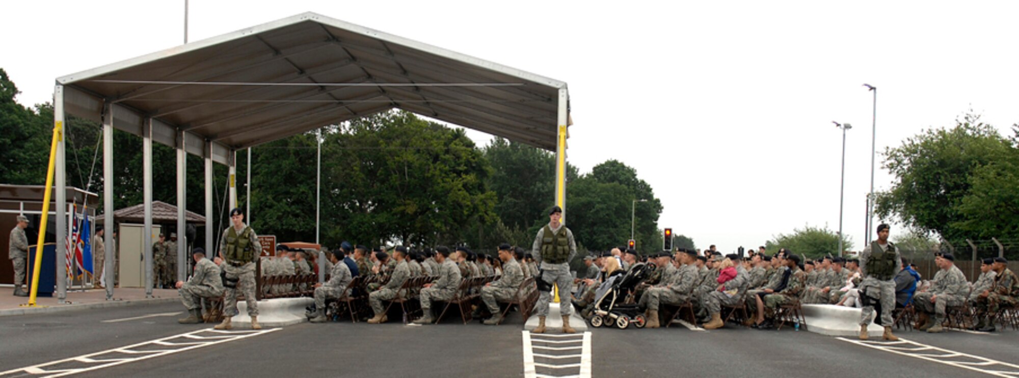 Liberty Warriors gathered together to honor Senior Airman Jason D. Nathan at a gate dedication ceremony June 1 at RAF Lakenheath, England. Airman Nathan was mortally wounded by an improvised explosive device June 23, 2007 while on combat patrol in Tikrit, Iraq in support of Operation Iraqi Freedom. (U.S. Air Force photo by Senior Airman Brian J. Ellis)