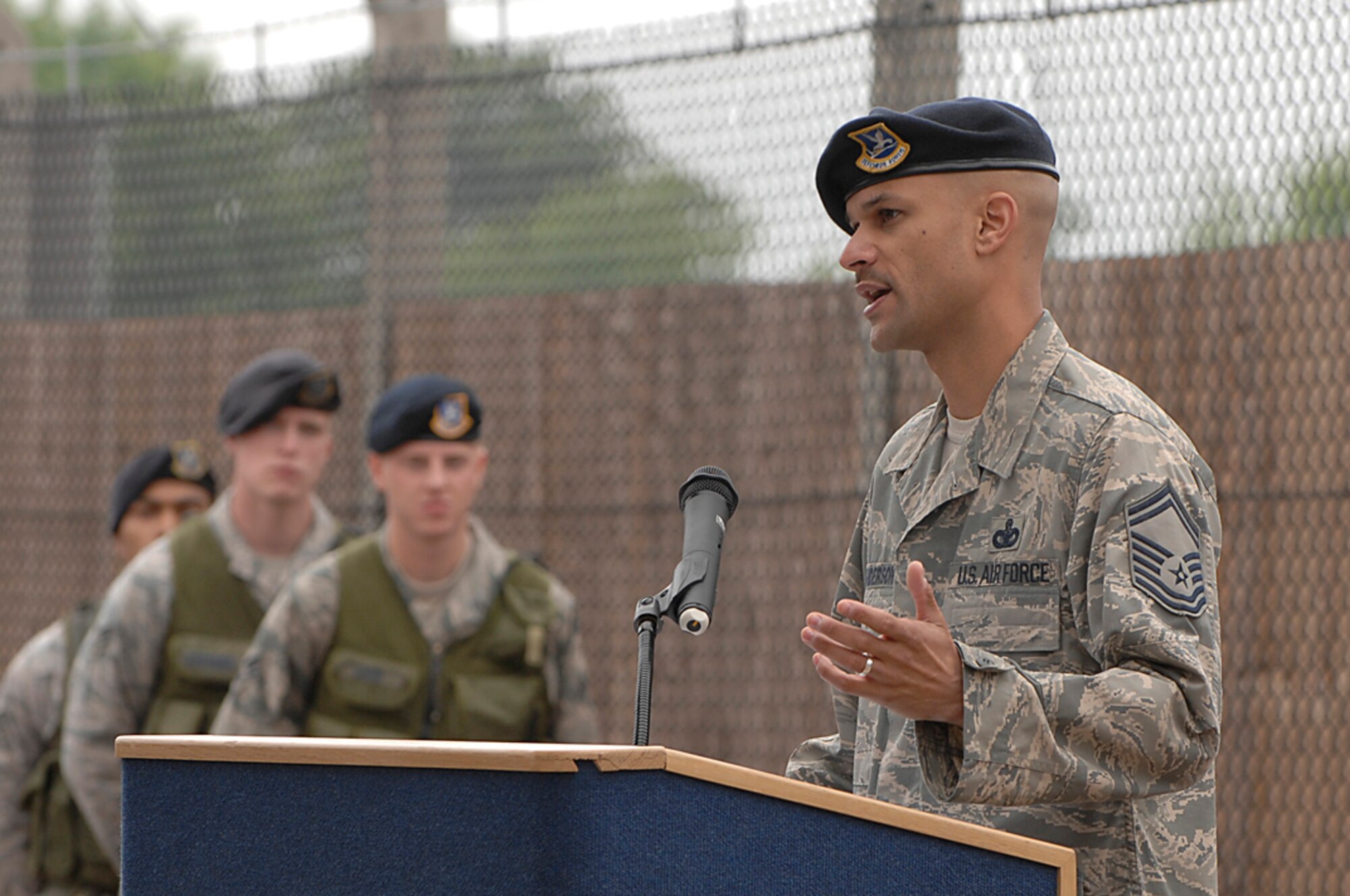 Senior Master Sgt. Killjan Anderson, 48th Security Forces Squadron superintendent of resources, gives a first-hand account of the day Senior Airman Jason Nathan lost his life at a gate dedication ceremony June 1 at RAF Lakenheath, England. Airman Nathan was mortally wounded by an improvised explosive device June 23, 2007 while on combat patrol in Tikrit, Iraq in support of Operation Iraqi Freedom. (U.S. Air Force photo by Senior Airman Brian J. Ellis)