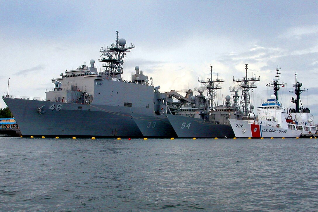 U.S. Navy and Coast Guard ships, from left, the amphibious dock landing ship USS Tortuga, the guided-missile frigate USS Jarrett, the guided-missile frigate USS Ford, and the U.S.Coast Guard cutter Morgenthau are moored at the commercial pier in Puerto Princesa at the conclusion of the Philippine portion of the Cooperation Afloat Readiness and Training 2008 exercise, Puerto Princesa, Philippines, June 2, 2008. The exercise is an annual series of bilateral maritime training events between the United States and six Southeast Asia nations to build relationships and enhance the operational readiness of participating forces. 