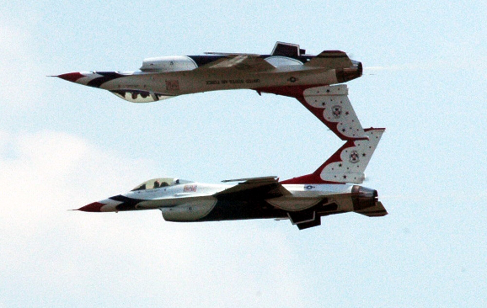 F-16 Fighting Falcons with the U.S. Air Force Thunderbirds aerial demonstration team, Nellis Air Force Base, Nev., fly during the McGuire Air Force Base, N.J., Air Expo June 1, 2008.  The Air Expo was the final event for Air Force Week in Philadelphia and more than 170,000 people attended.  (U.S. Air Force Photo/Tech. Sgt. Scott T. Sturkol)