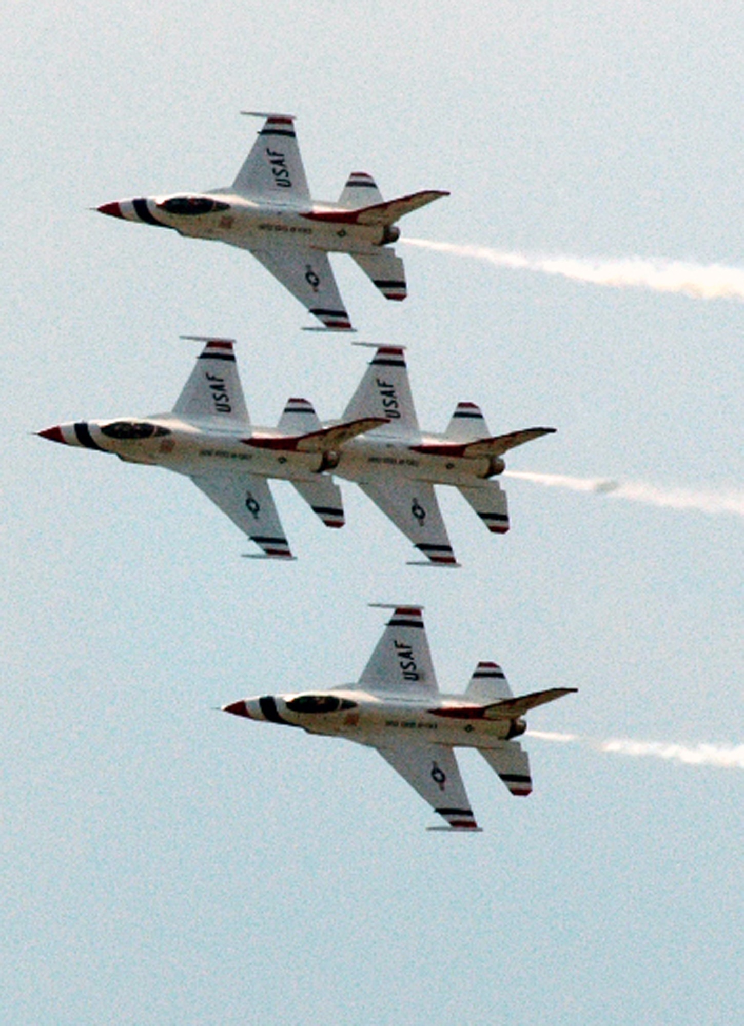 F-16 Fighting Falcons with the U.S. Air Force Thunderbirds aerial demonstration team, Nellis Air Force Base, Nev., fly in a tight-ship formation during the McGuire Air Force Base, N.J., Air Expo June 1, 2008.  The Air Expo was the final event for Air Force Week in Philadelphia and more than 170,000 people attended.  (U.S. Air Force Photo/Tech. Sgt. Scott T. Sturkol)