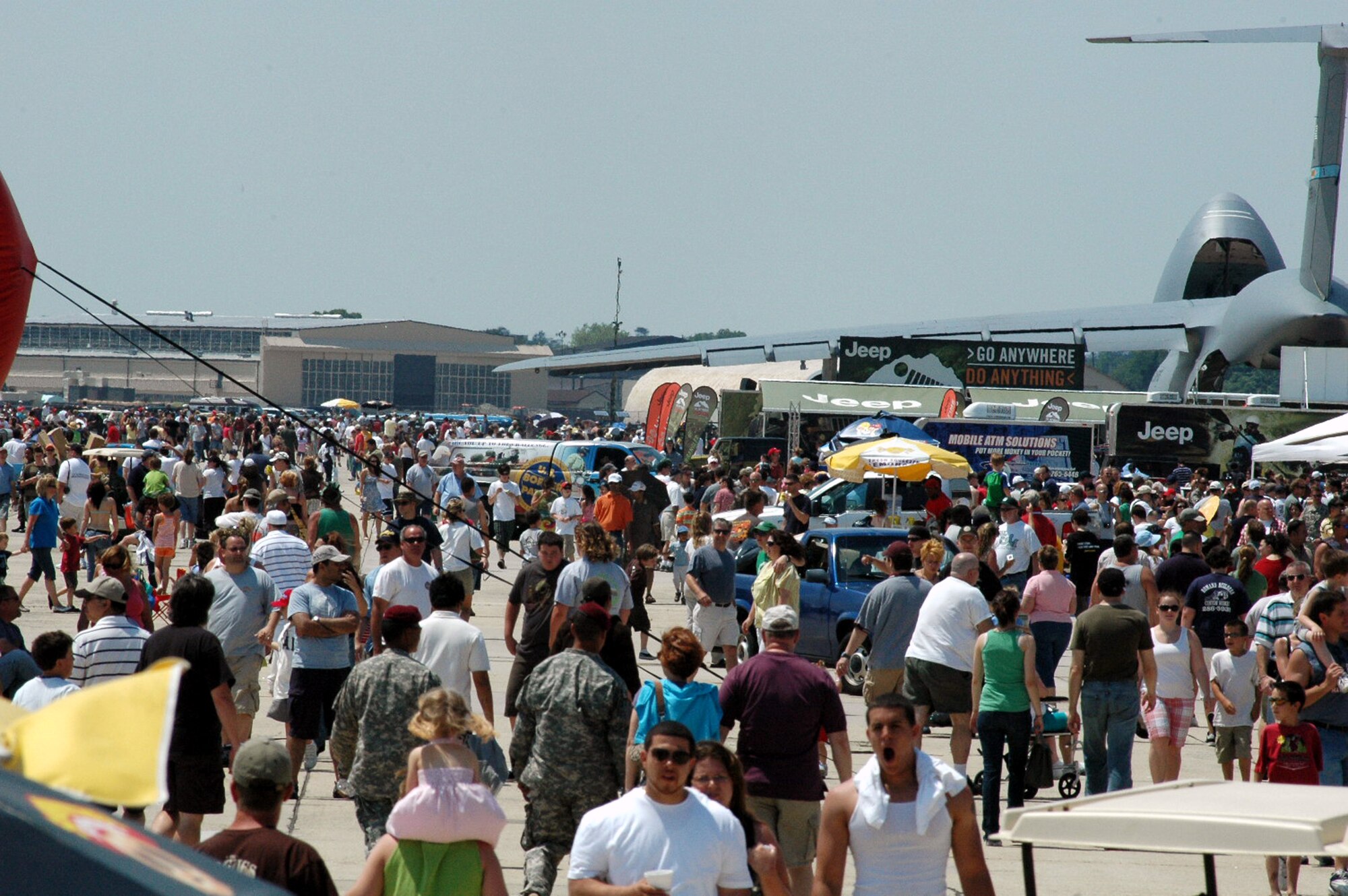 Thousands of visitors walk along looking over static displays and other attractions at McGuire Air Force Base, N.J., during the McGuire Air Expo 2008 June 1.  More than 170,000 people attended the Air Expo.  (U.S. Air Force Photo/Tech. Sgt. Scott T. Sturkol)