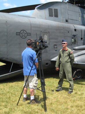 Tech. Sgt. Linwood Stull, an aerial gunner with the 20th Special Operations Squadron, is interviewed by a television news reporter in Roanoke, Va., during the squadron’s final mountain training exercise May 28 through June 5. Sergeant Stull is from Eagle Rock, Va., near Roanoke. (U.S. Air Force photo/Maj. Randy Smith) 