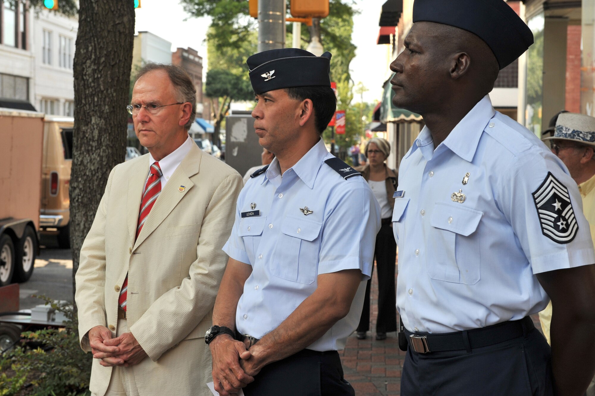 SUMTER, S.C. -- Mayor Joseph McElveen Jr., Col. Ted Uchida 20th Mission Support Group commander and Chief Master Sgt. Lefford Fate, 20th Fighter Wing command chief, participate in the opening ceremonies of the 7th annual Sumter-Shaw Street Fest in downtown Sumter, May 30. The festival gives Shaw members the opportunity to interact with the local community and educate them about Shaw's mission. (U.S. Air Force photo/Tech. Sgt. Josef Cole III)
