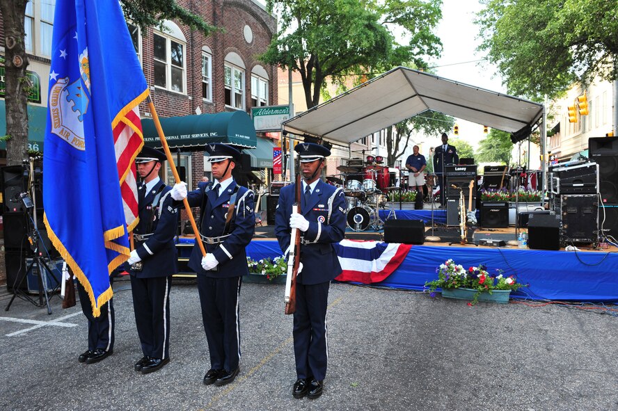 SUMTER, S.C. -- Members of the Shaw Air Force Base Honor Guard post the colors at the 7th annual Sumter-Shaw Street Fest opening ceremony on Main Street in down town Sumter May 30. The festival gives Shaw members the opportunity to interact with the local community and educate them about Shaw's Air Force mission. (U.S. Air Force photo/Tech. Sgt. Josef Cole III)